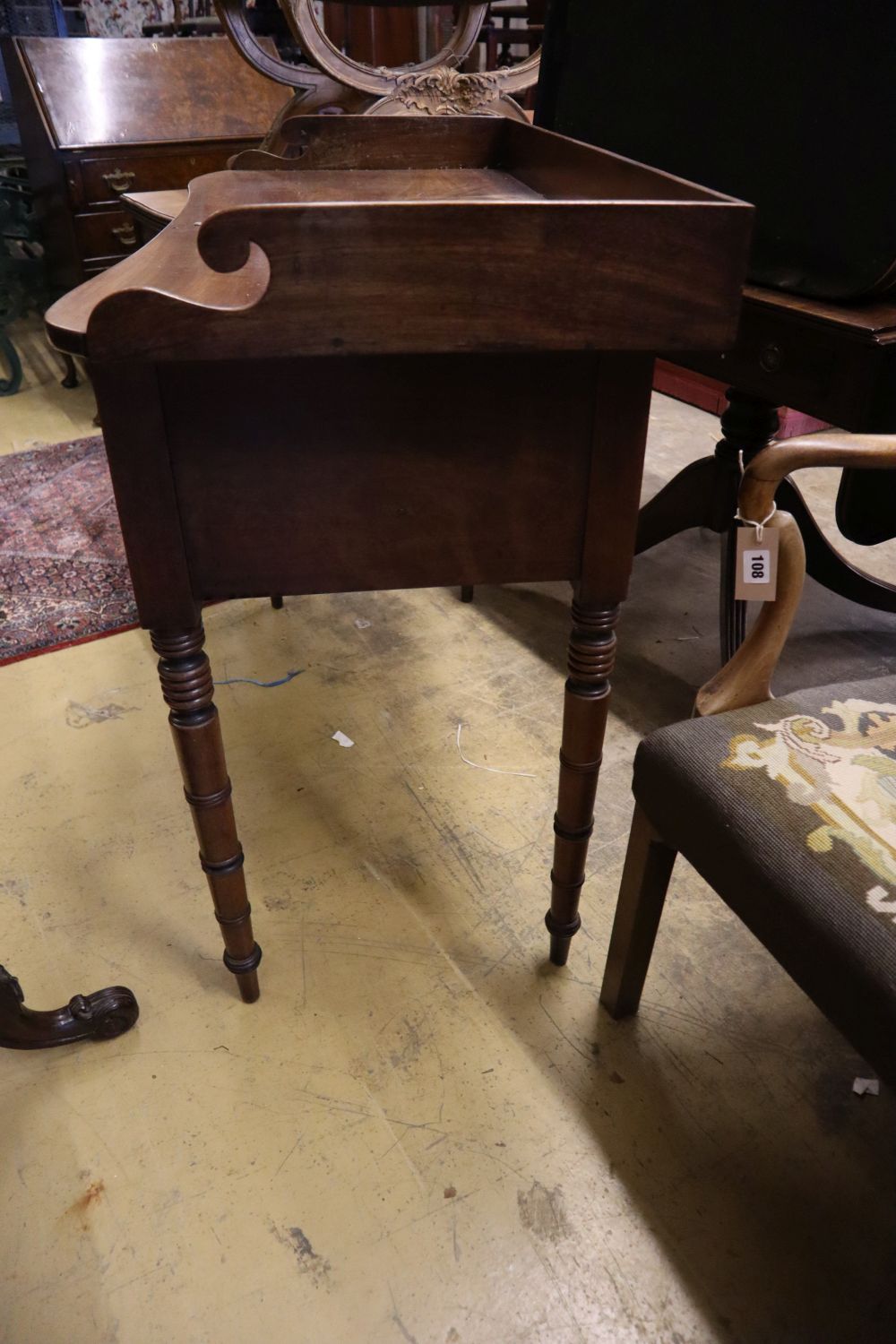 A Regency mahogany dressing table, width 107cm, depth 53cm, height 89cm